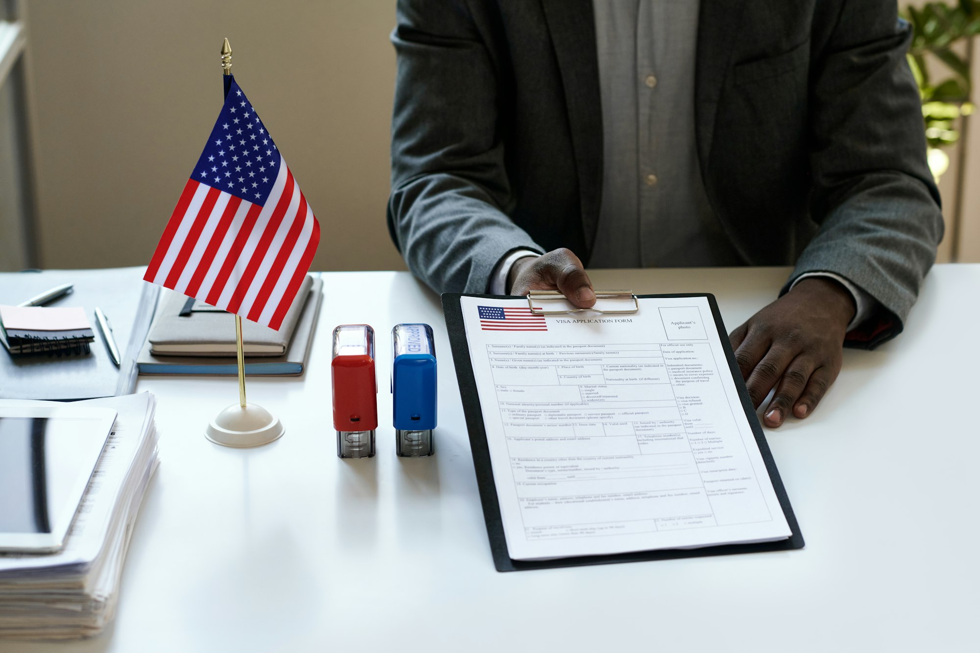Manager with blank in visa centre